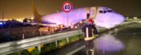 Picture of an aircraft that has overshot the runway.