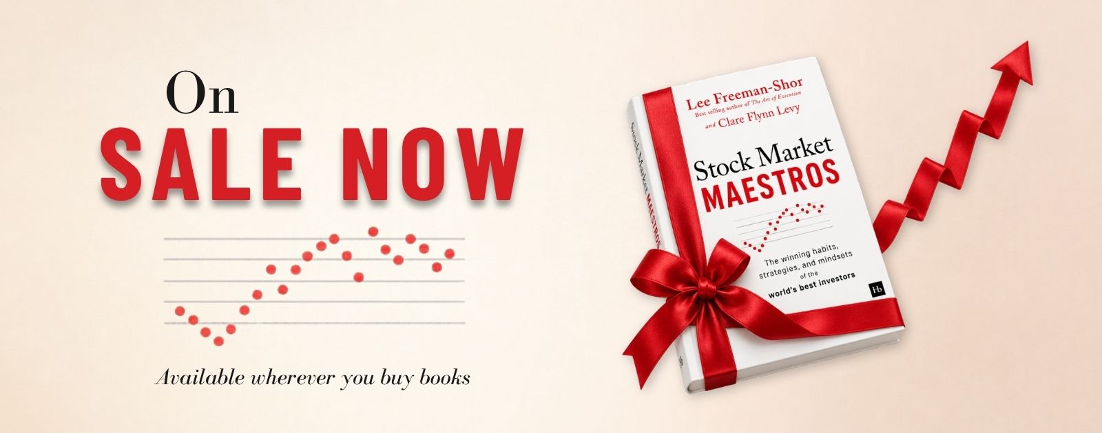 Stock Market Maestros by Lee Freeman-Shor and Clare Flynn Levy, on sale now, wrapped in a red holiday ribbon